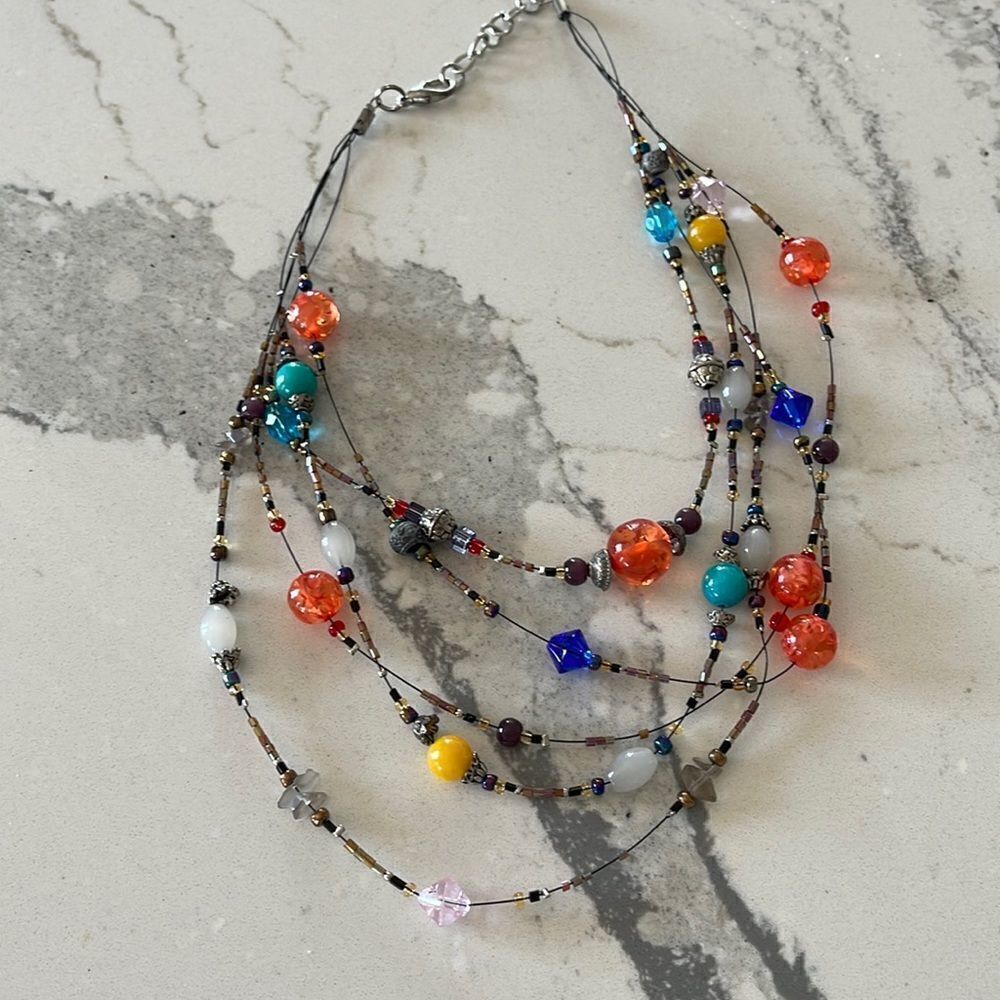 Fun multi color glass head necklace. All of the beads are glass. Art event
